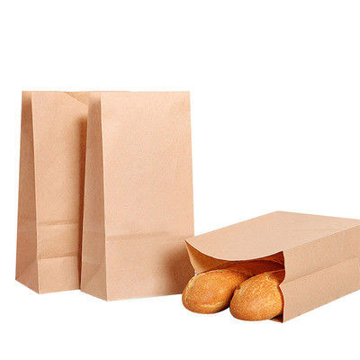 O papel de embalagem reciclado leva embora a entrega de empacotamento do alimento dos sacos do restaurante