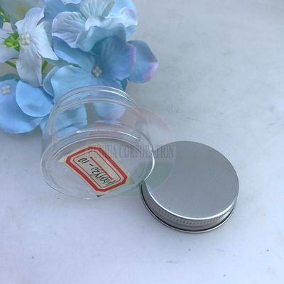 O cilindro plástico claro dos confeitos 420ml pode com tampa de alumínio